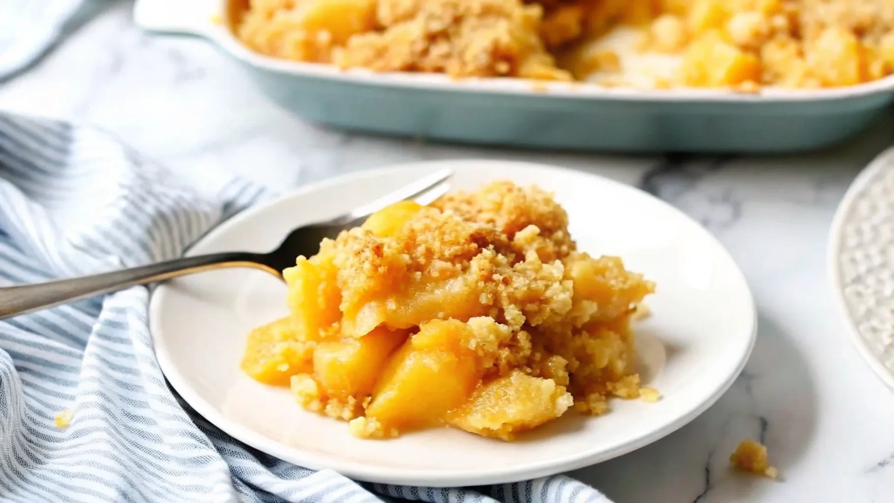 Freshly baked pineapple casserole with golden cracker topping.